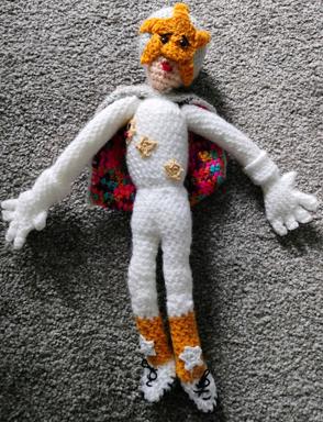 The doll, lying on the floor